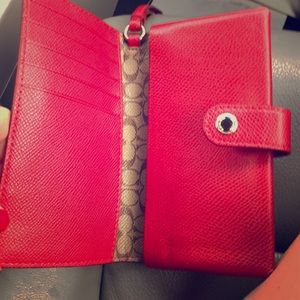 Coach wristlet holds credit card and iPhone